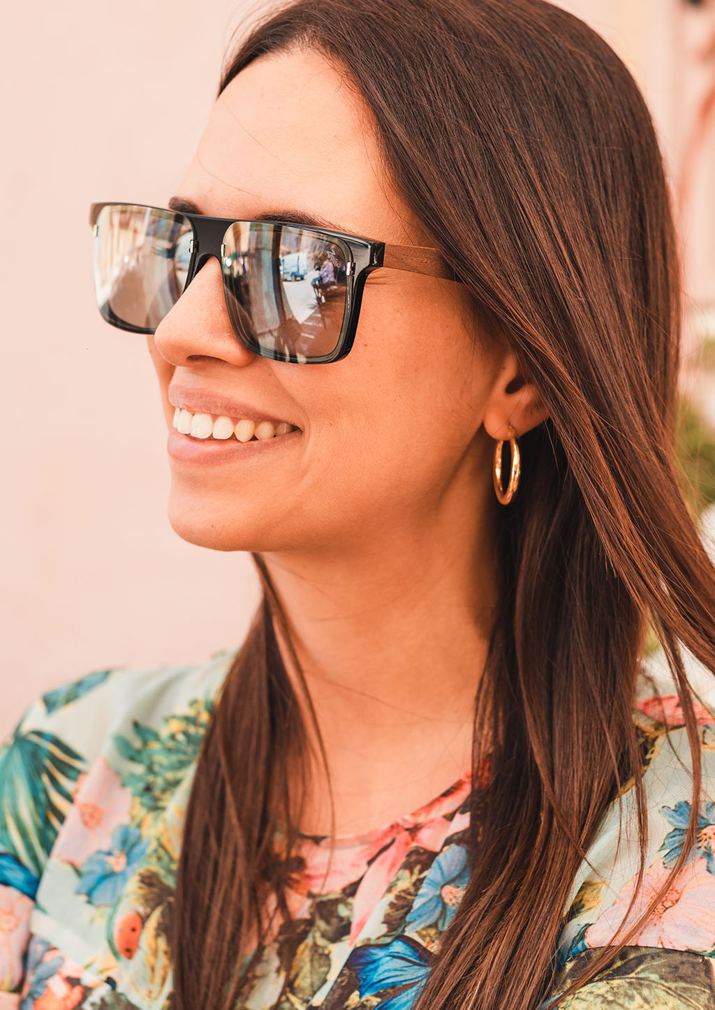 Eyewood ReInvented sunglasses featuring walnut wood temples and acetate front, showcasing unique grain patterns.