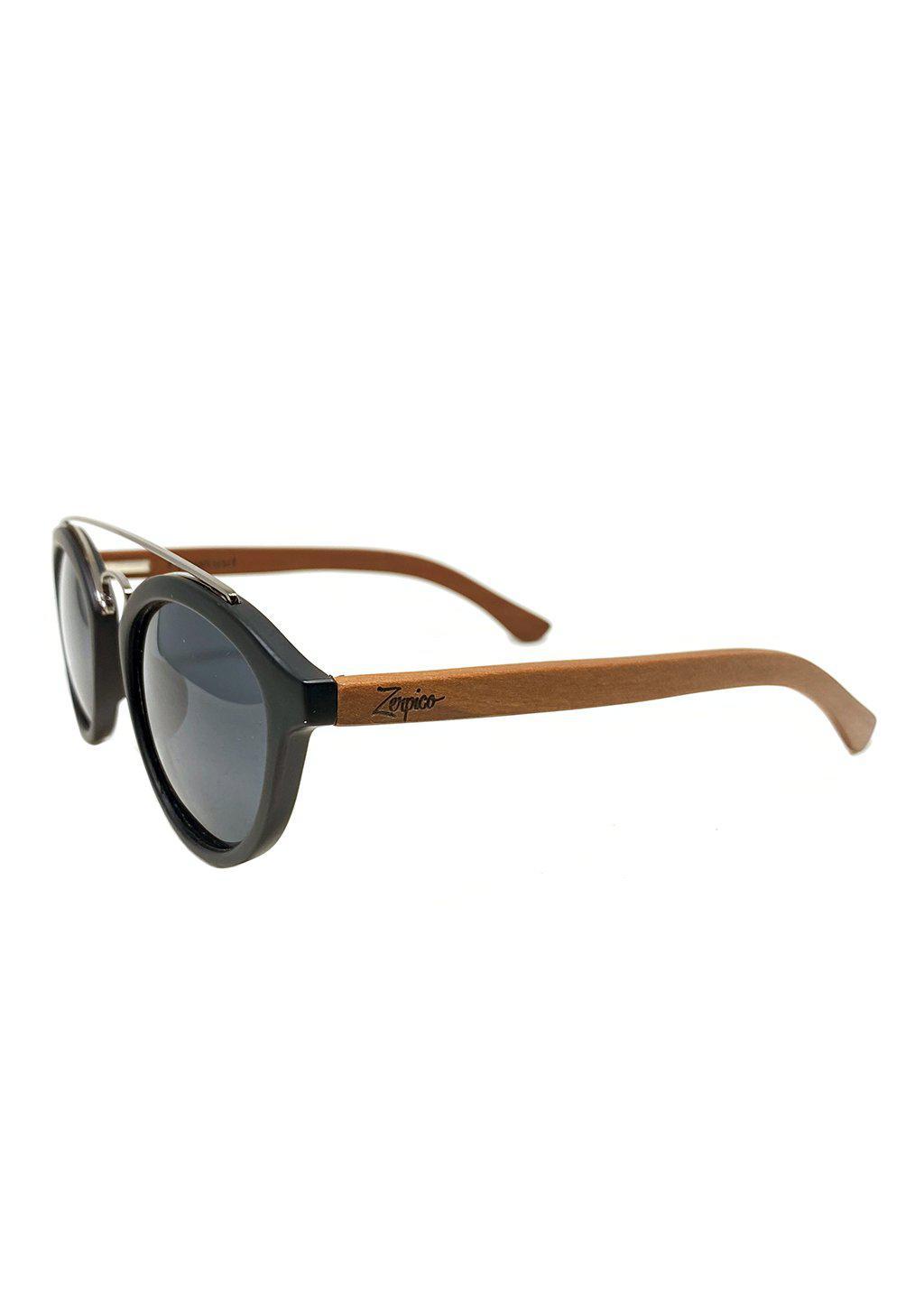 Eyewood Round - Lyric handmade wooden sunglasses featuring polarized grey lenses and unique rosewood design.