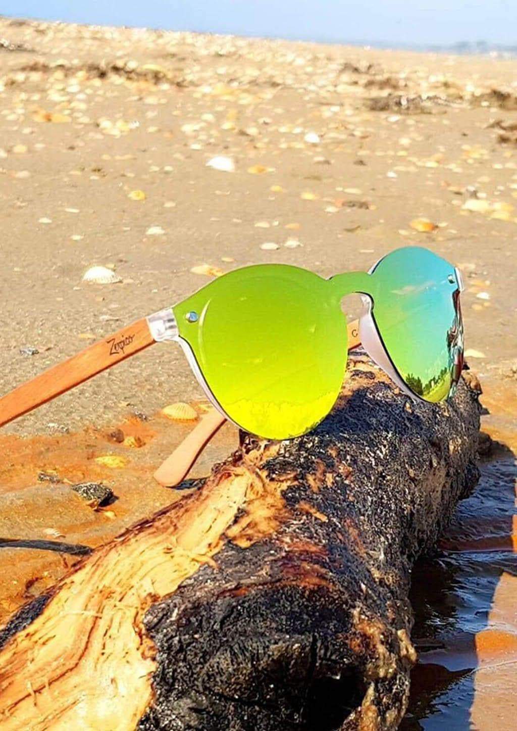 Eyewood Tomorrow - Antlia wooden sunglasses featuring rosewood frame and polarized yellow lenses, elegantly displayed in a handmade empress tree case.