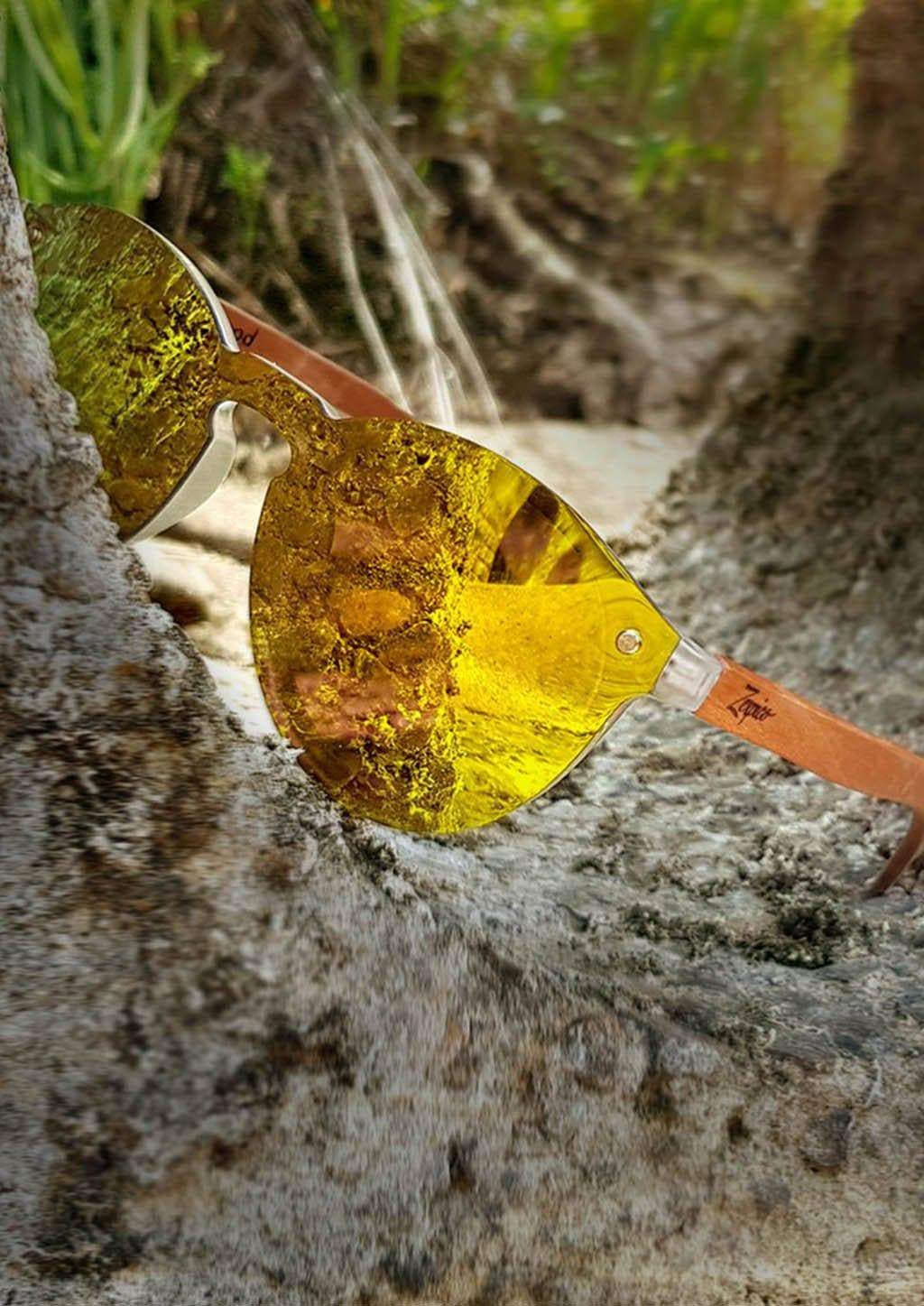 Eyewood Tomorrow - Antlia wooden sunglasses featuring rosewood frame and polarized yellow lenses, elegantly displayed in a handmade empress tree case.