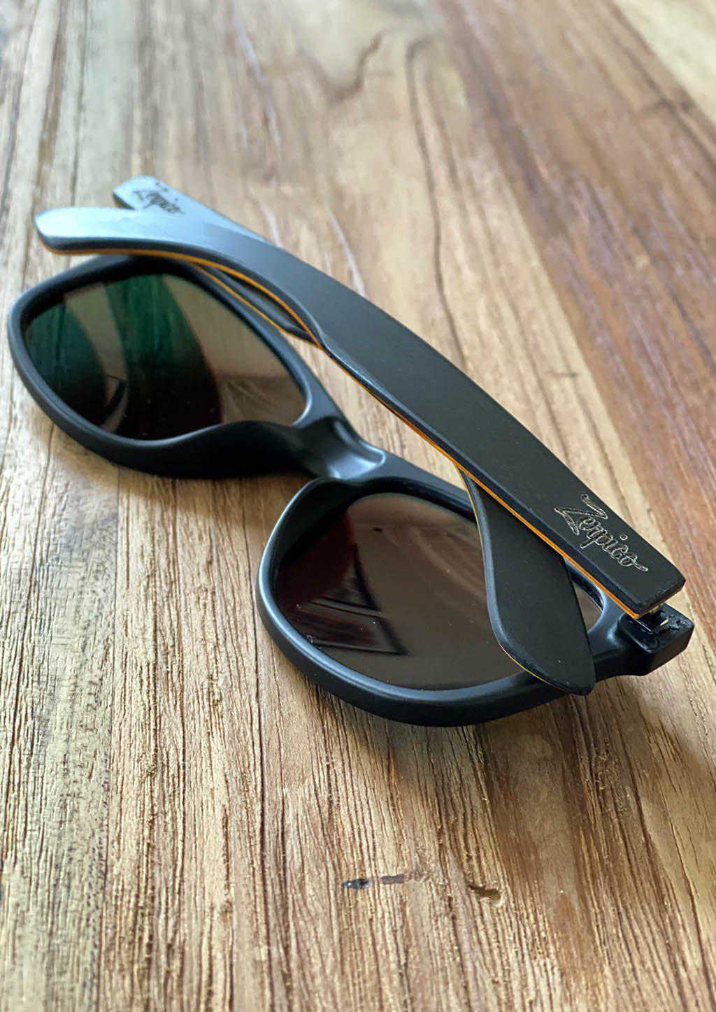 Eyewood Wayfarer 3rd Year Anniversary Edition sunglasses with red mirror lenses and wooden frame, presented in an exclusive empress tree case.