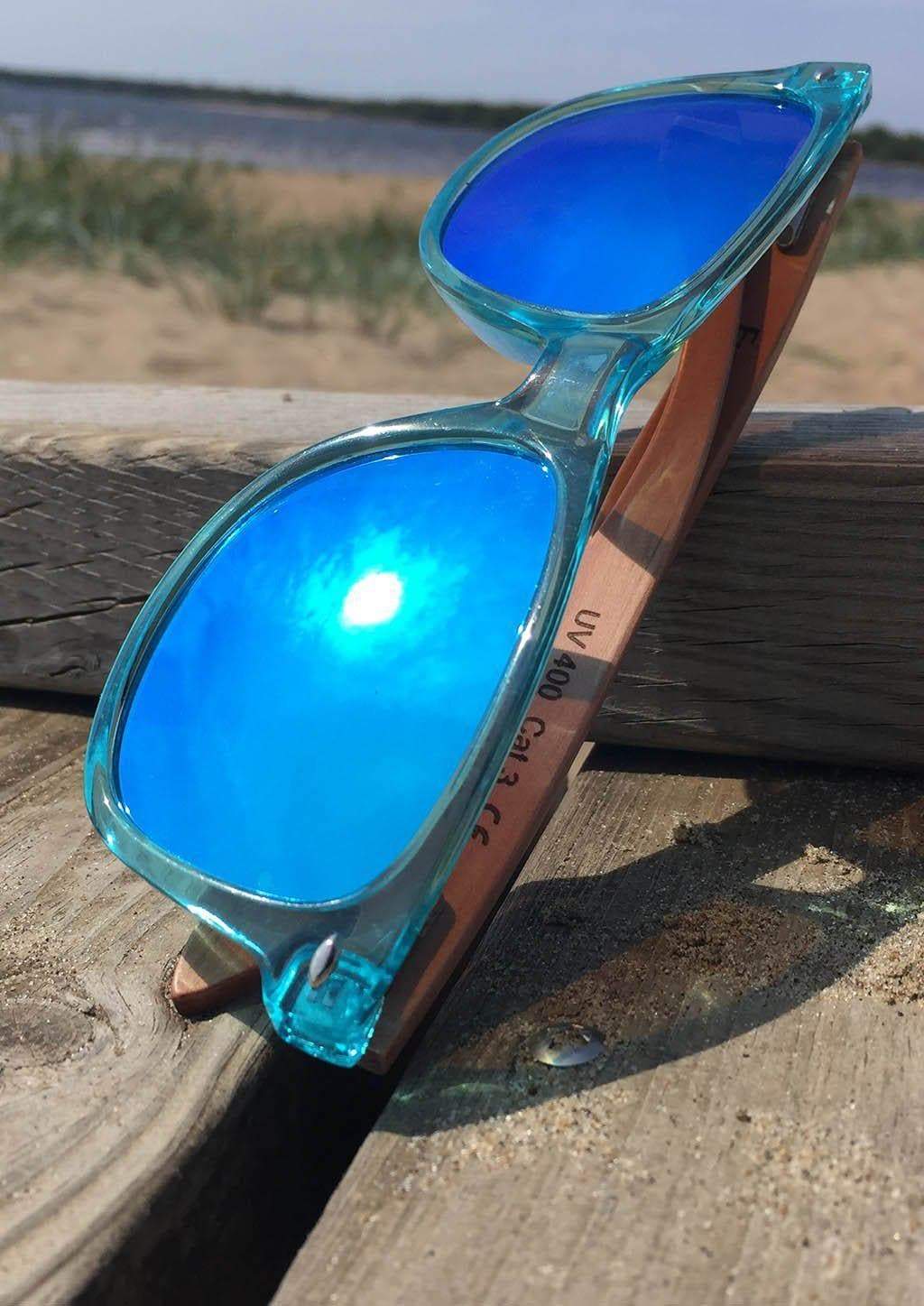 Eyewood Wayfarer - Sapphire wooden sunglasses with blue mirror lenses and rosewood frame, displayed elegantly.