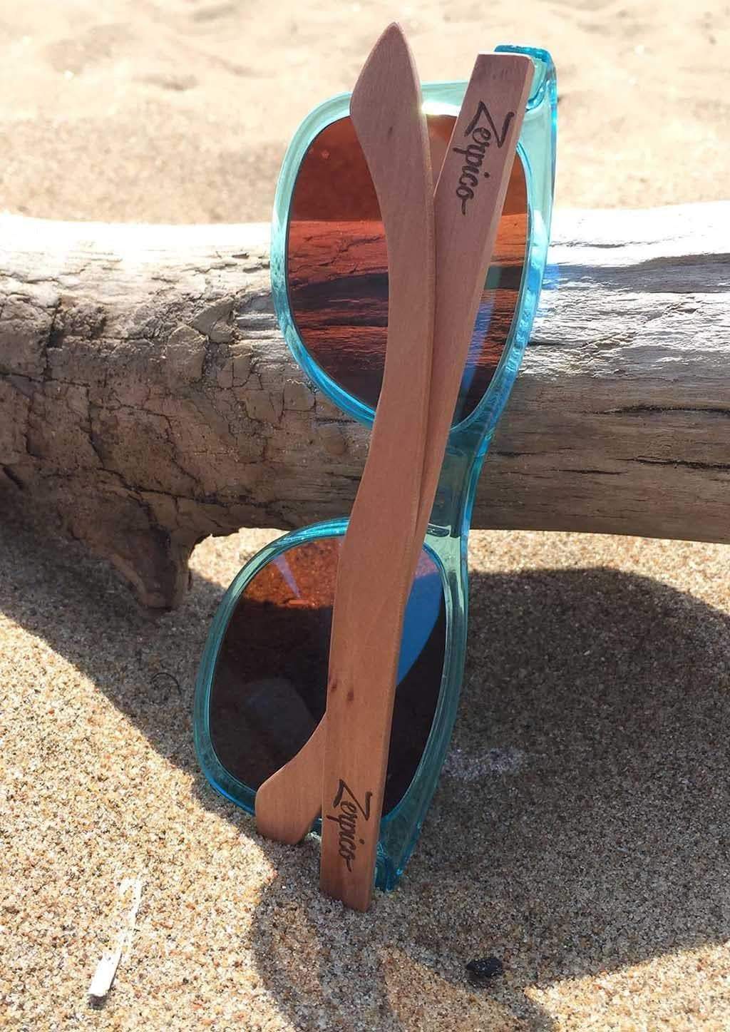 Eyewood Wayfarer - Sapphire wooden sunglasses with blue mirror lenses and rosewood frame, displayed elegantly.