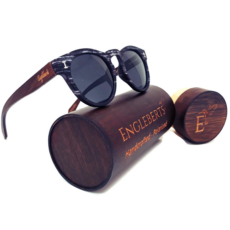 Granite colored bamboo sunglasses with polarized lenses and a handcrafted wood case, showcasing a stylish and eco-friendly design.