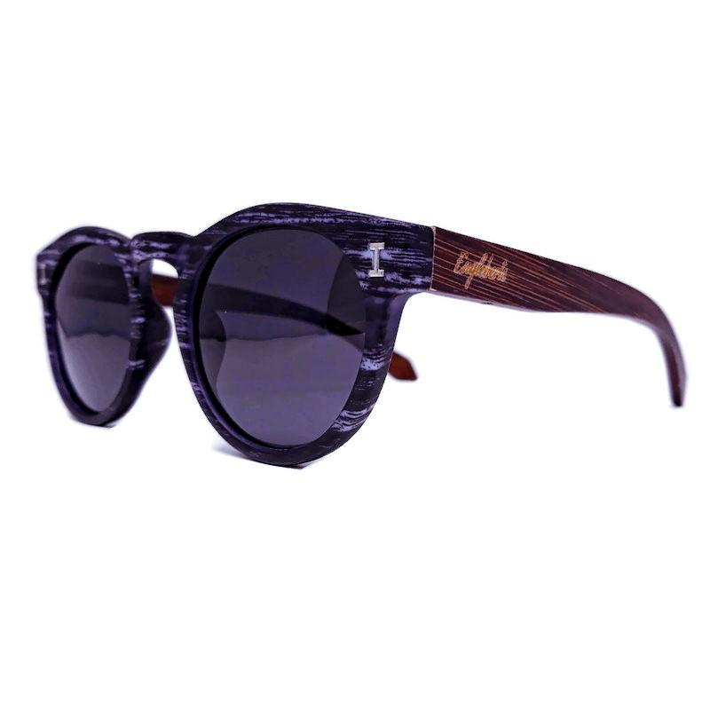 Granite colored bamboo sunglasses with polarized lenses and a handcrafted wood case, showcasing a stylish and eco-friendly design.