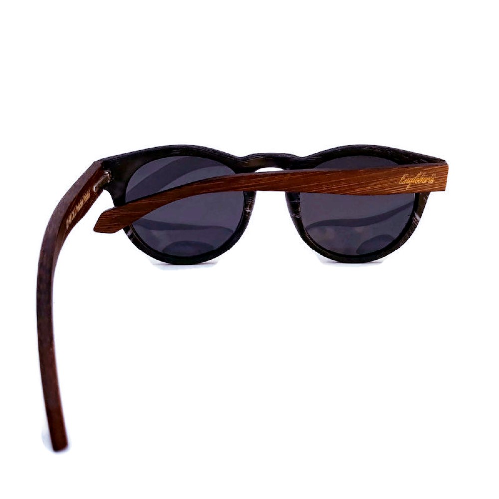 Granite colored bamboo sunglasses with polarized lenses and a handcrafted wood case, showcasing a stylish and eco-friendly design.