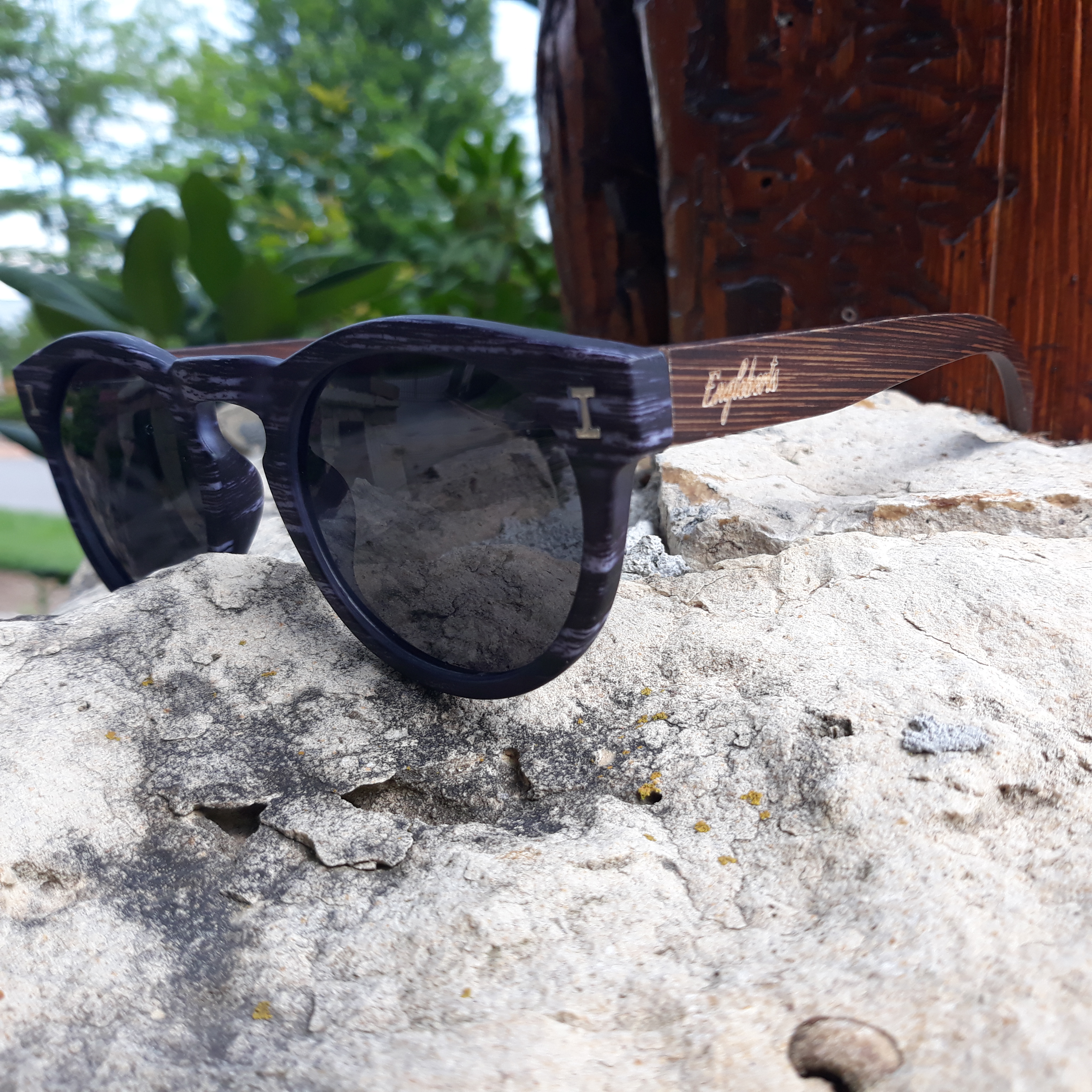 Granite colored bamboo sunglasses with polarized lenses, showcasing unique handcrafted design and stylish frame.