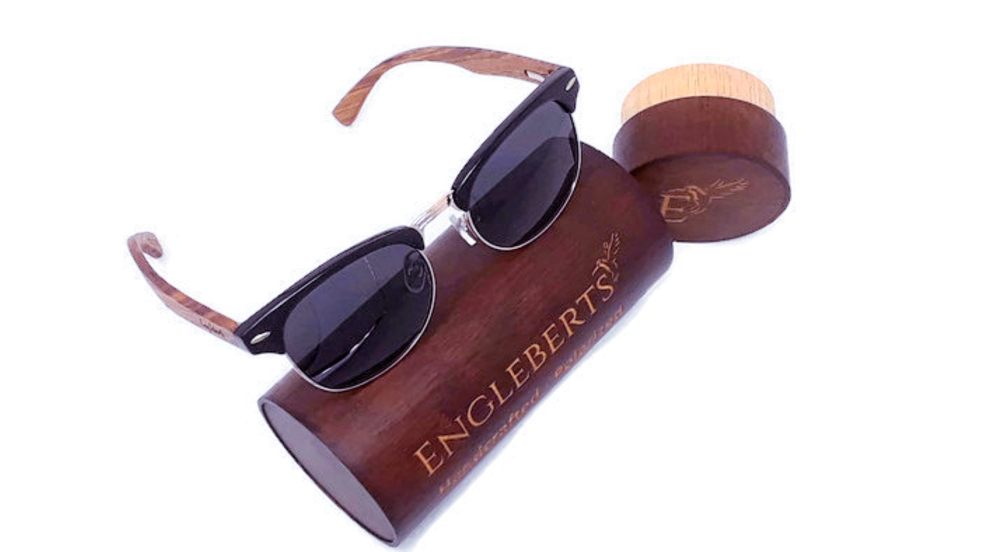 Handcrafted wooden sunglasses protective case made from natural bamboo, showcasing its unique design and earthy texture.