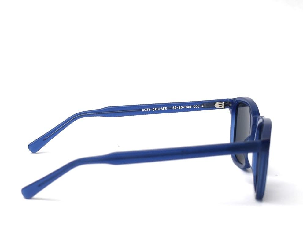 Kozy Cruiser Crystal Blue eyewear featuring a stylish acetate frame and Zeiss CR39 lenses.