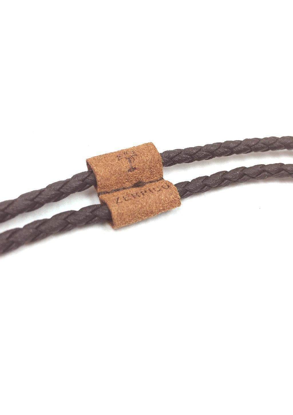 Brown braided leather safety strap for sunglasses, designed for comfort and style.