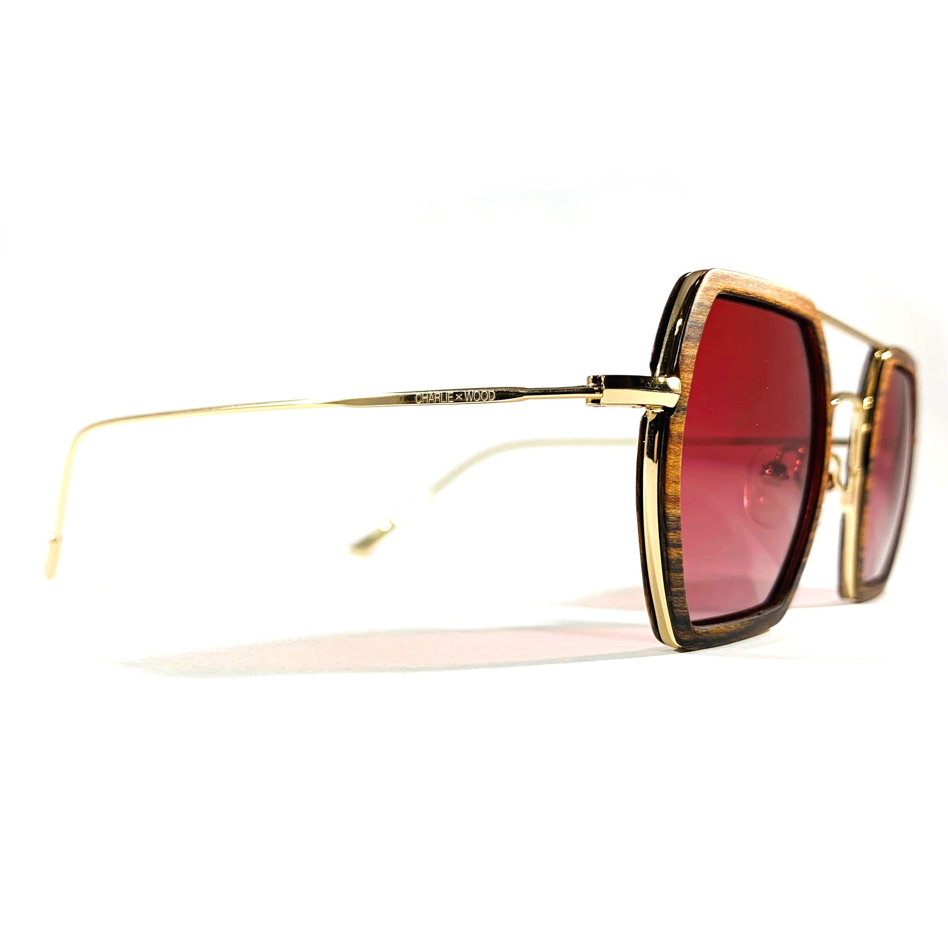 Stylish Little 5 Points sunglasses made from Brazilian rosewood with polarized rose gradient lenses, showcasing a unique design.