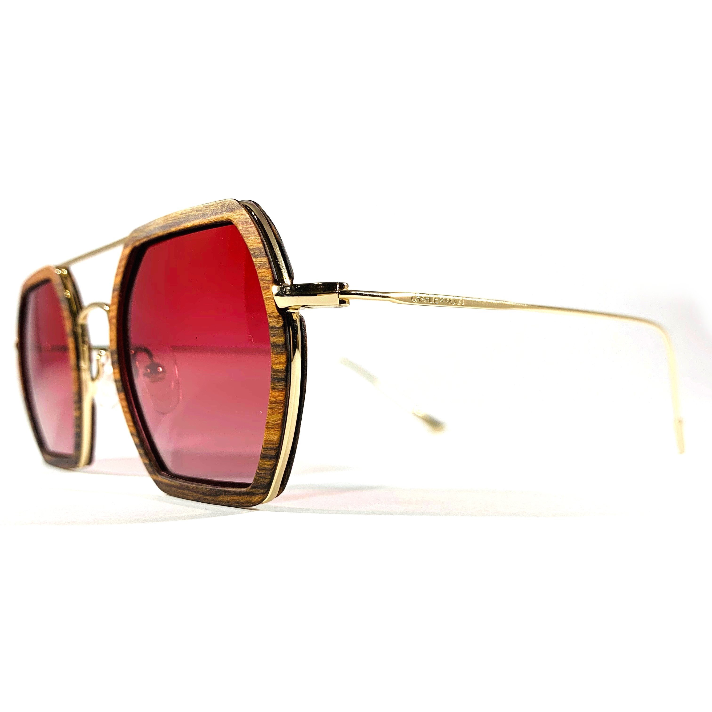 Stylish Little 5 Points sunglasses made from Brazilian rosewood with polarized rose gradient lenses, showcasing a unique design.