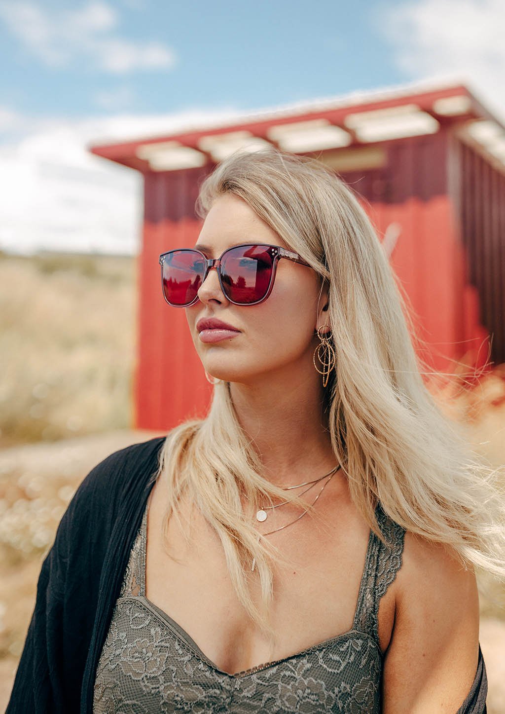 Stylish Magnolia sunglasses from the Babylon Series with a classic wayfarer shape and vibrant Mediterranean-inspired colors.