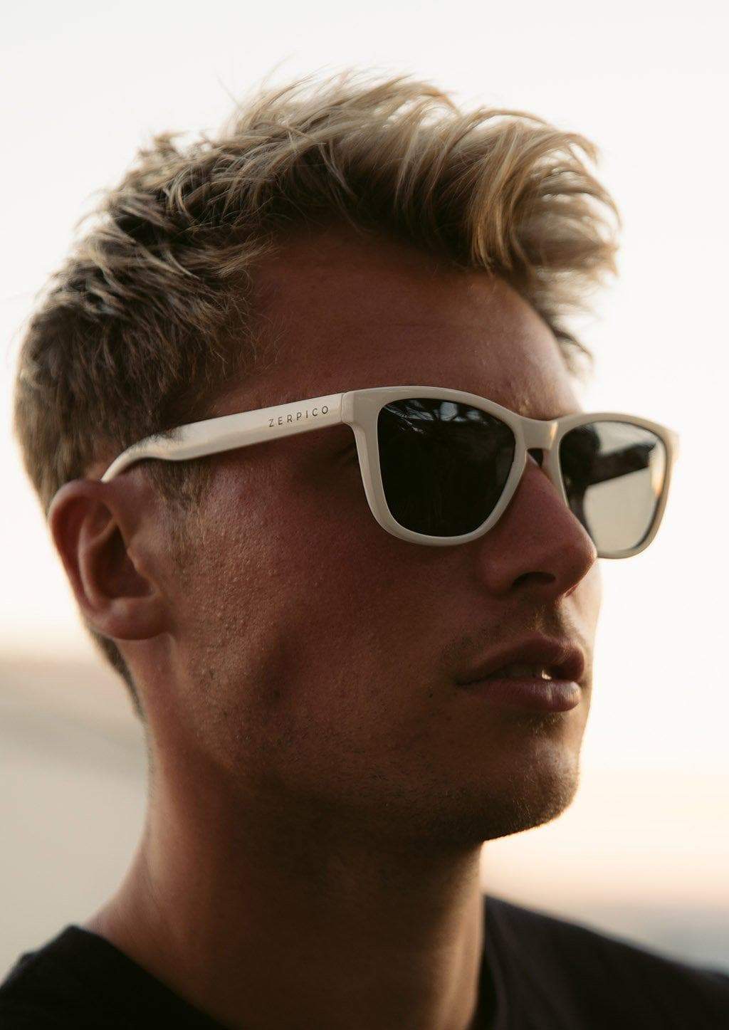 MOOD Wayfarer V2 - Ace sunglasses featuring a white frame and black polarized lenses, perfect for stylish outdoor adventures.