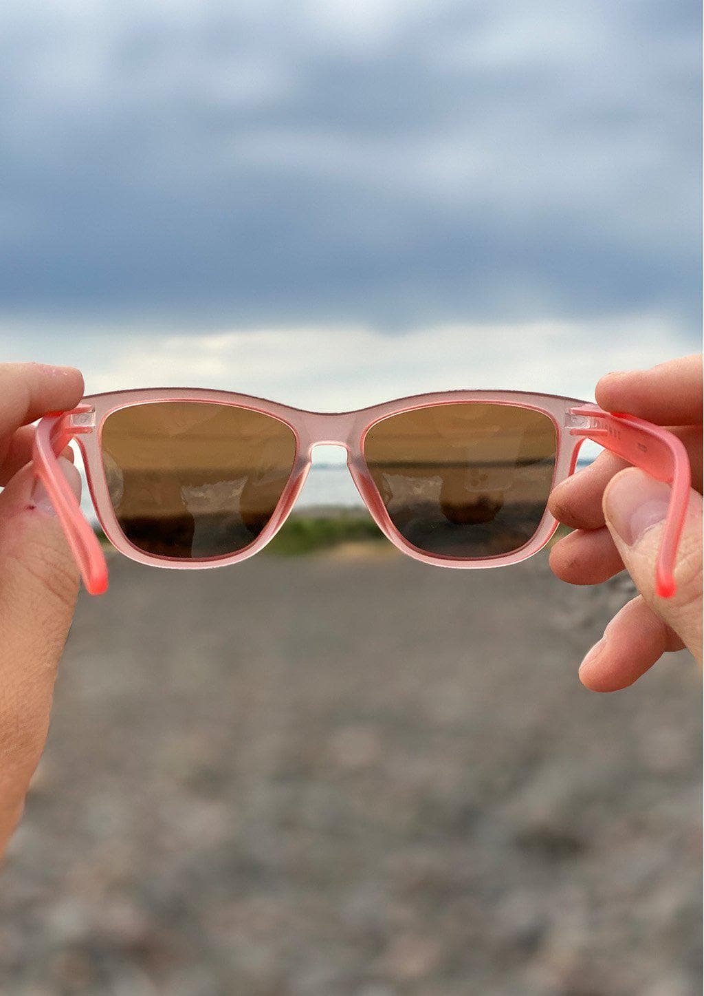 MOOD Wayfarer V2 Cherry sunglasses featuring a red frame and red polarized lenses, stylishly designed for outdoor adventures.