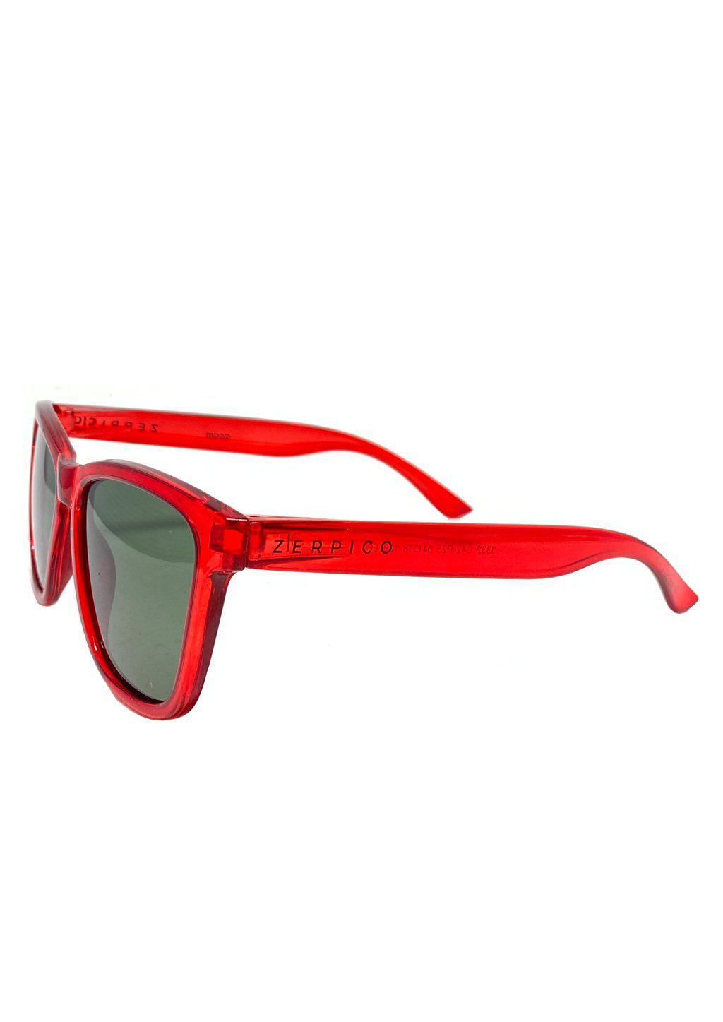 MOOD Wayfarer V2 - Deco sunglasses featuring a red transparent frame and green lenses, perfect for stylish outdoor adventures.