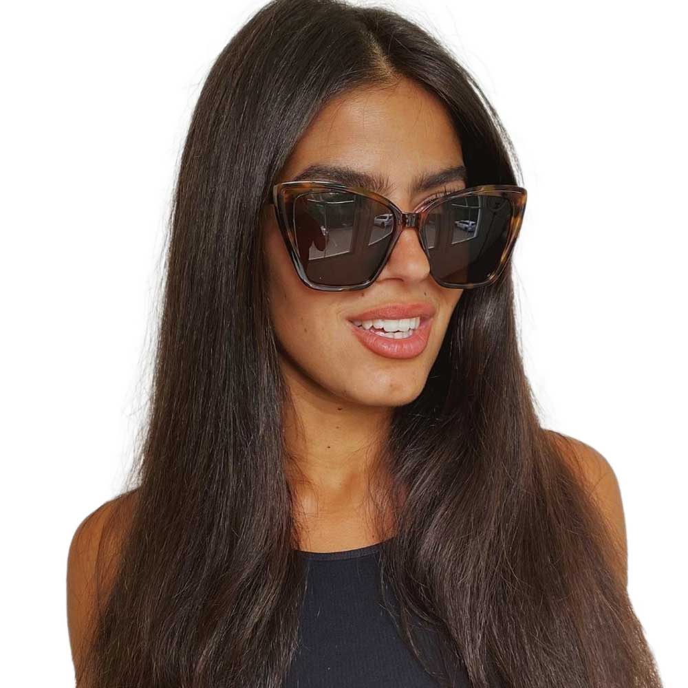 A pair of stylish Moscow sunglasses featuring an oversized cat-eye frame, perfect for sun protection and fashion.