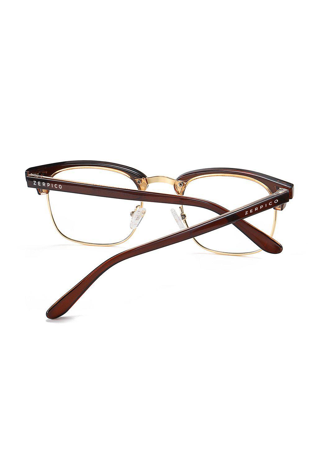 Nexus Ark blue-light glasses featuring a classic clubmaster design in black and gold.