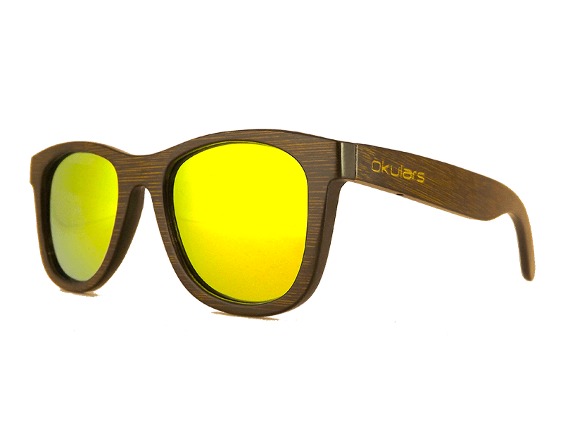 Okulars® Dark Bamboo sunglasses featuring a dark bamboo frame and golden polarized lenses, elegantly displayed in a natural setting.