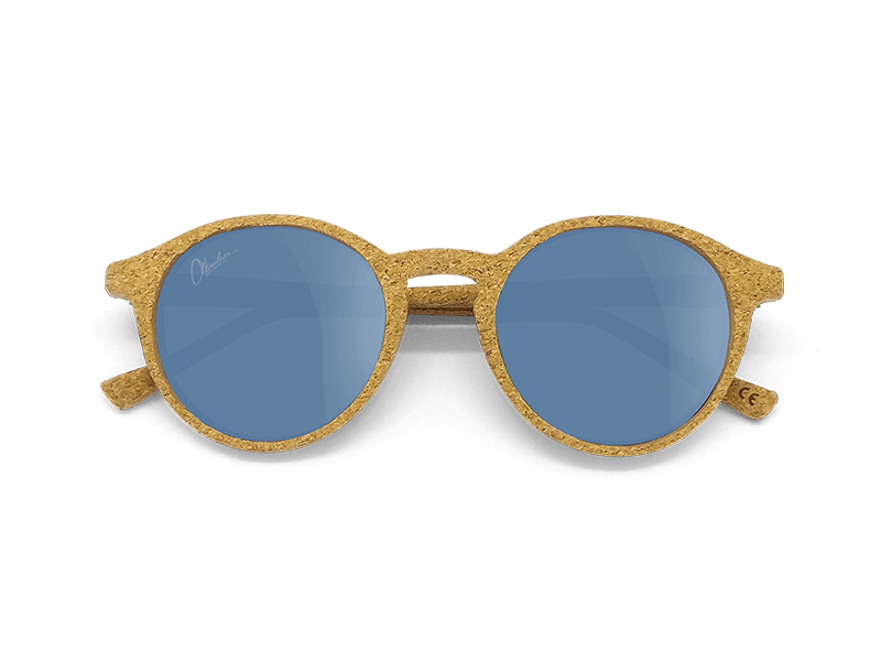 Okulars® Oak Still sunglasses with transparent blue lenses and natural cork frame, showcasing a stylish and lightweight design.