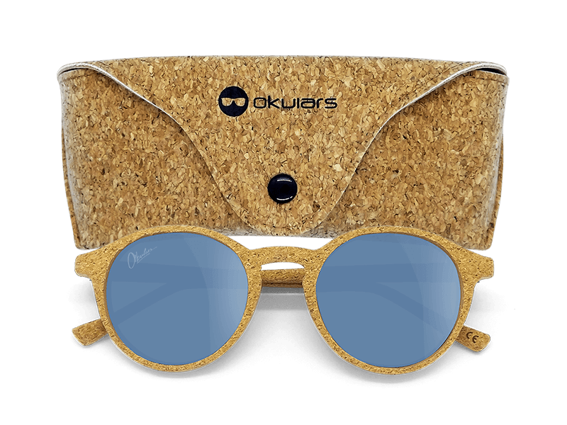 Okulars® Oak Still sunglasses with transparent blue lenses and natural cork frame, showcasing a stylish and lightweight design.