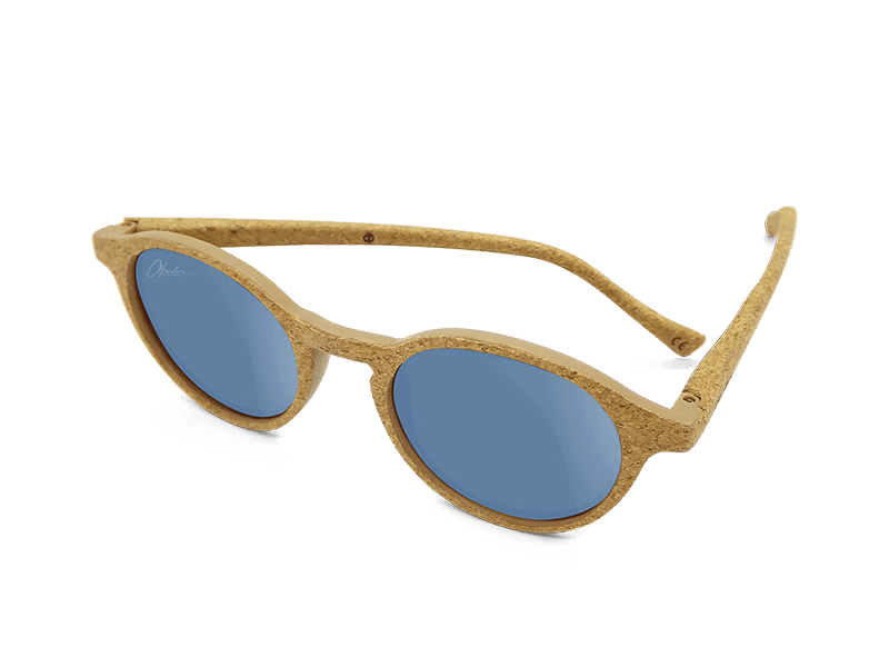 Okulars® Oak Still sunglasses with transparent blue lenses and natural cork frame, showcasing a stylish and lightweight design.