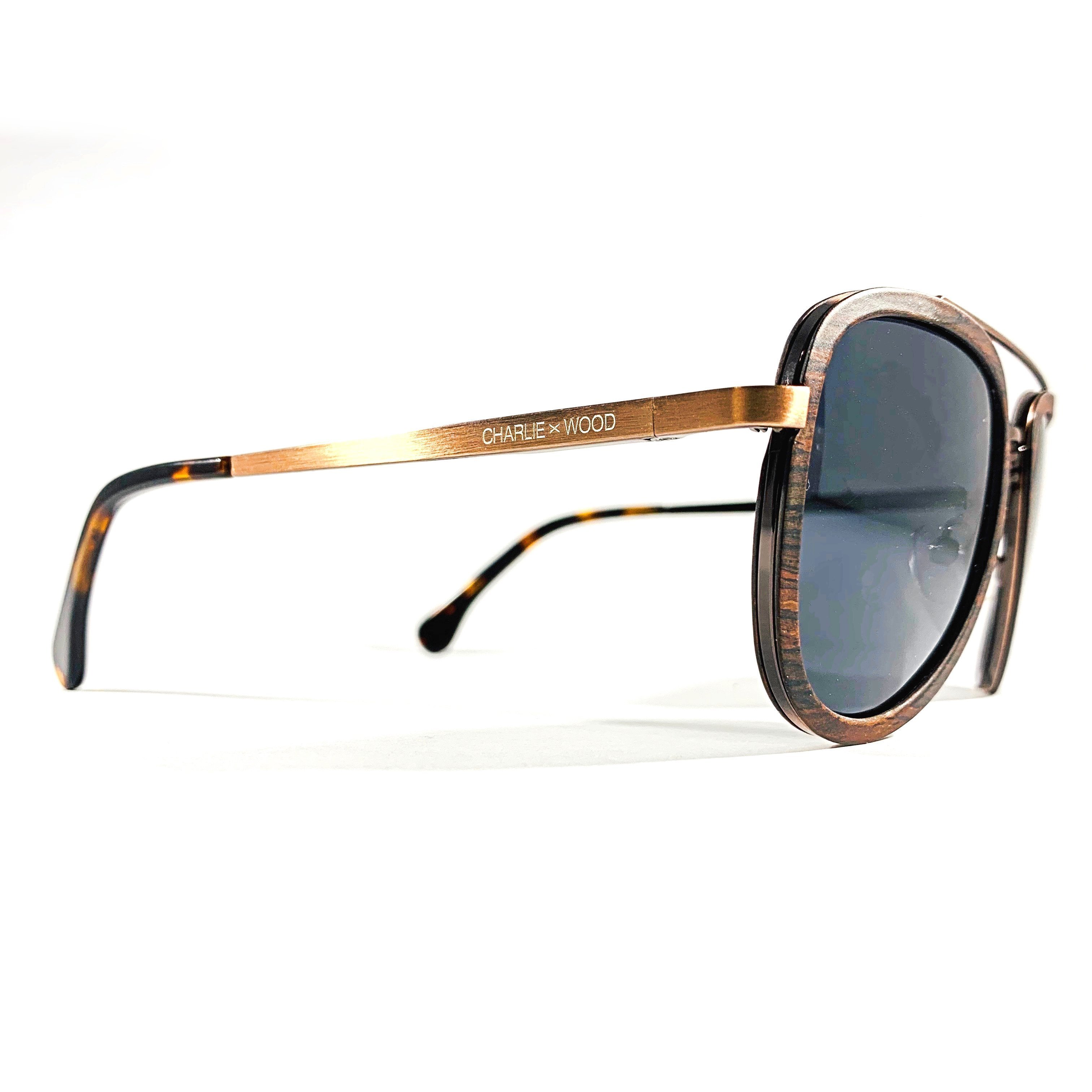 Old 4th Ward sunglasses made from ebony wood with polarized grey lenses, showcasing a stylish and durable design.