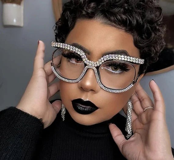 A pair of stylish Rhinestone Designer Frames featuring clear lenses and sparkling rhinestones, perfect for trendy eyewear.