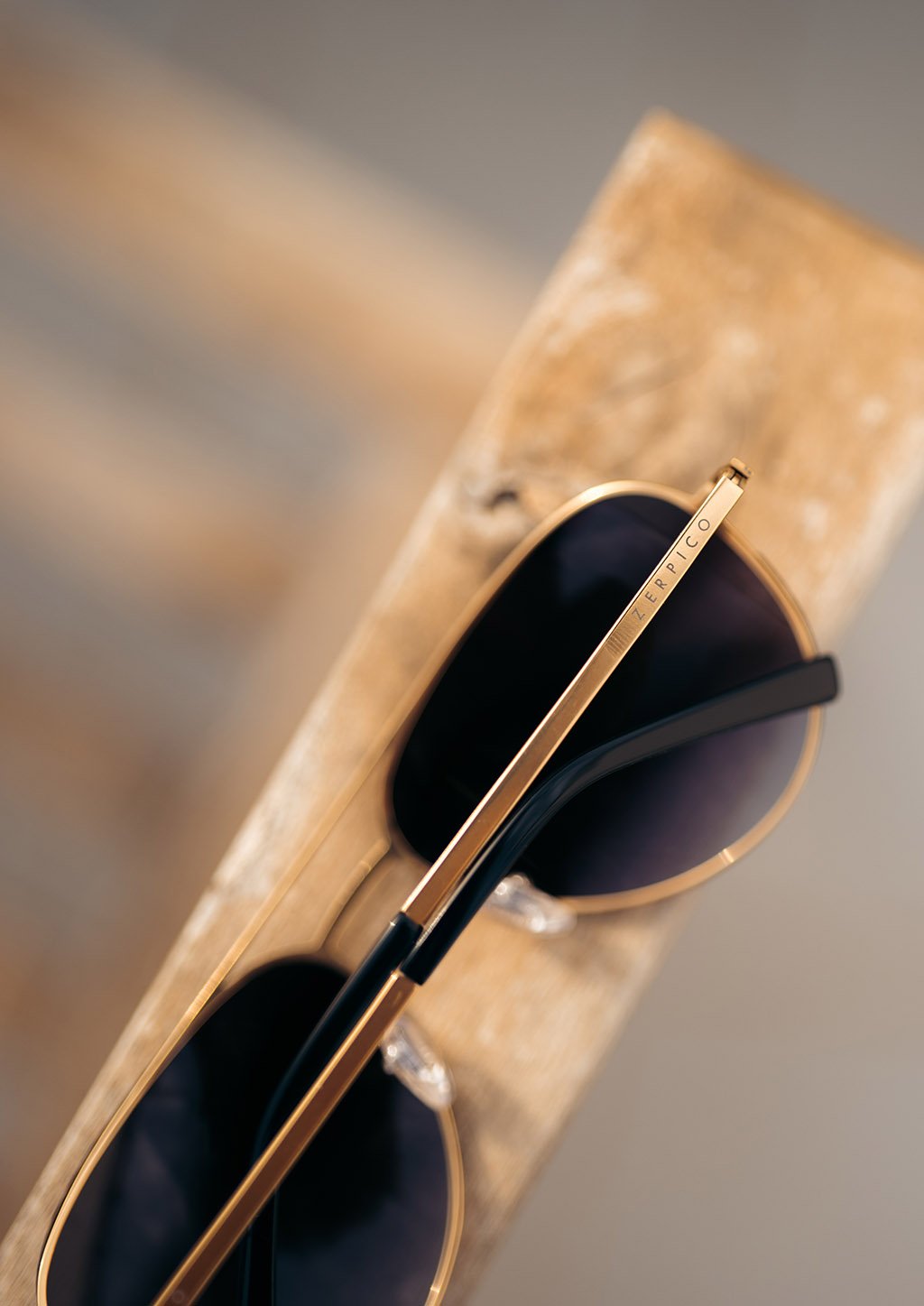 Titanium Aviators - V2 sunglasses with changeable lenses in various colors displayed elegantly.