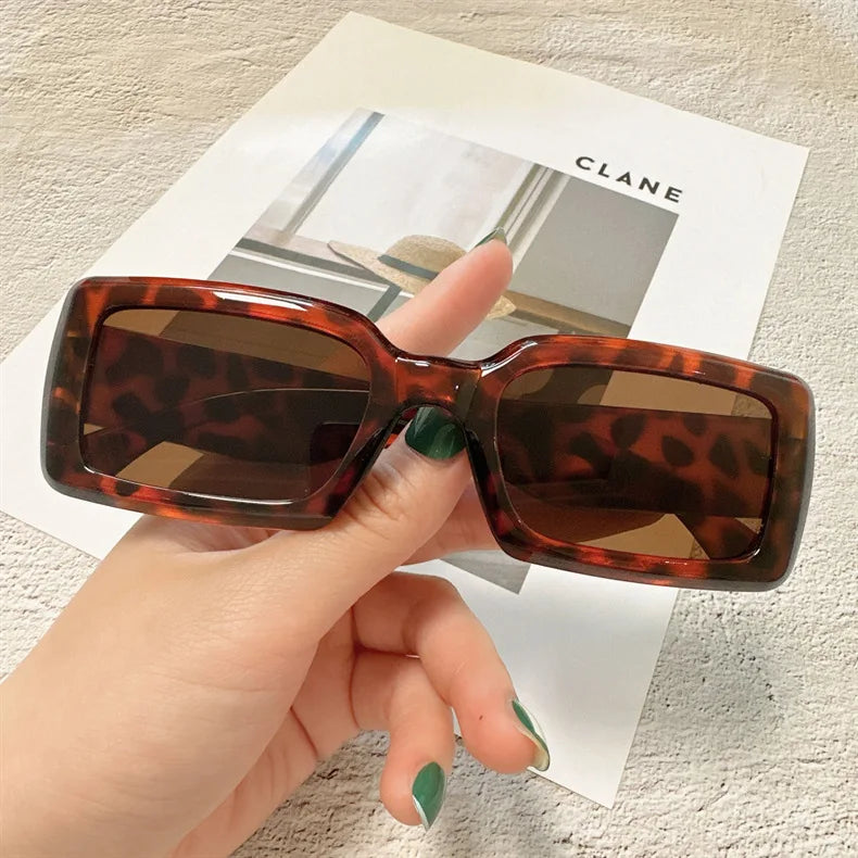 Women Small Rectangle Outdoor Travel Sunglasses with polycarbonate lenses, perfect for outdoor activities and stylish looks.