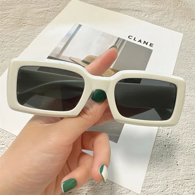 Women Small Rectangle Outdoor Travel Sunglasses with polycarbonate lenses, perfect for outdoor activities and stylish looks.