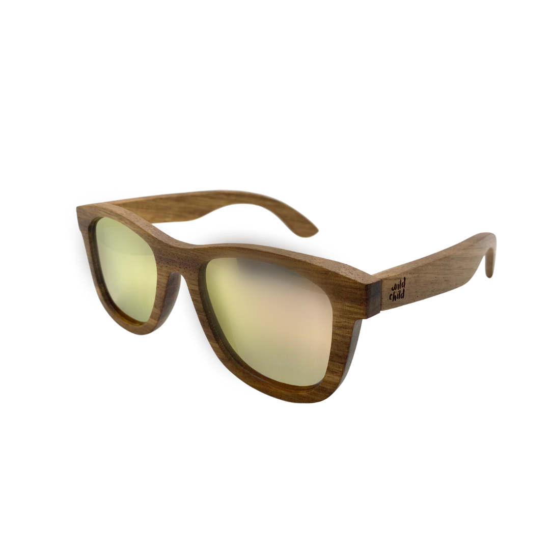 Stylish zebra wood sunglasses with rose gold polarized lenses, designed for kids aged 3-8, floating on water.