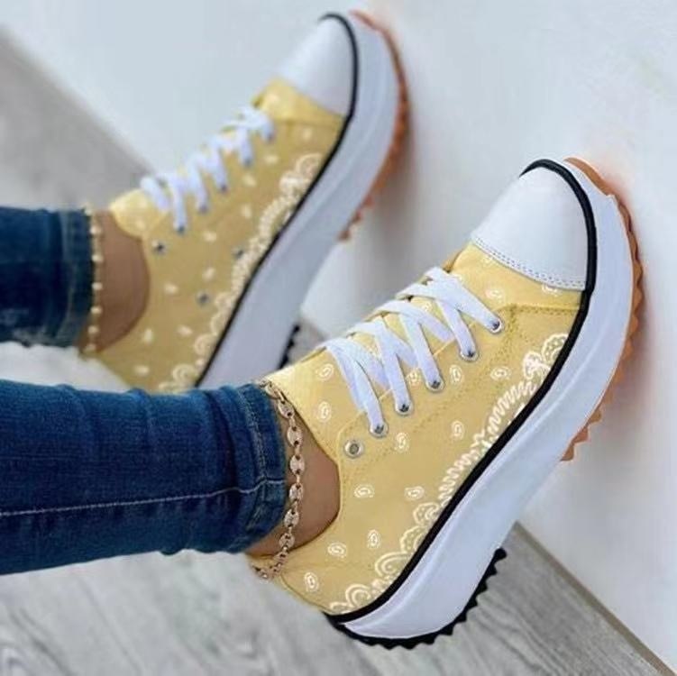 Fashion Women Sneakers in a stylish canvas pattern, perfect for casual sports and everyday wear.