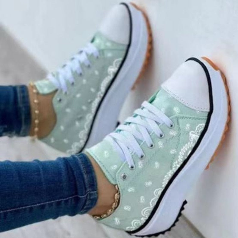 Fashion Women Sneakers in a stylish canvas pattern, perfect for casual sports and everyday wear.