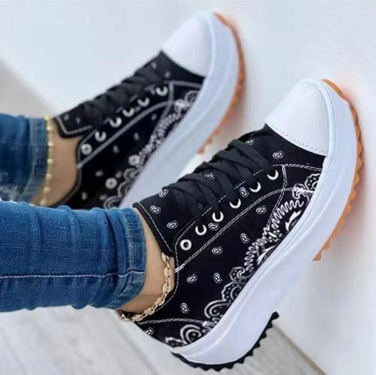 Fashion Women Sneakers in a stylish canvas pattern, perfect for casual sports and everyday wear.