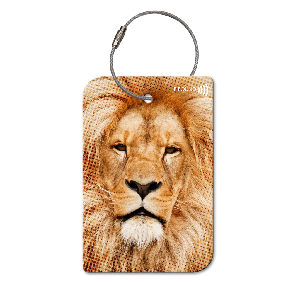 Lion Retreev SMART Tag attached to a stylish travel bag, showcasing its durable stainless steel design.