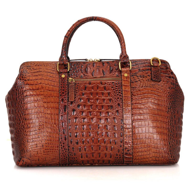 Ultimate Leather Weekender bag made of full grain leather, spacious and stylish, perfect for travel with a sleek design.