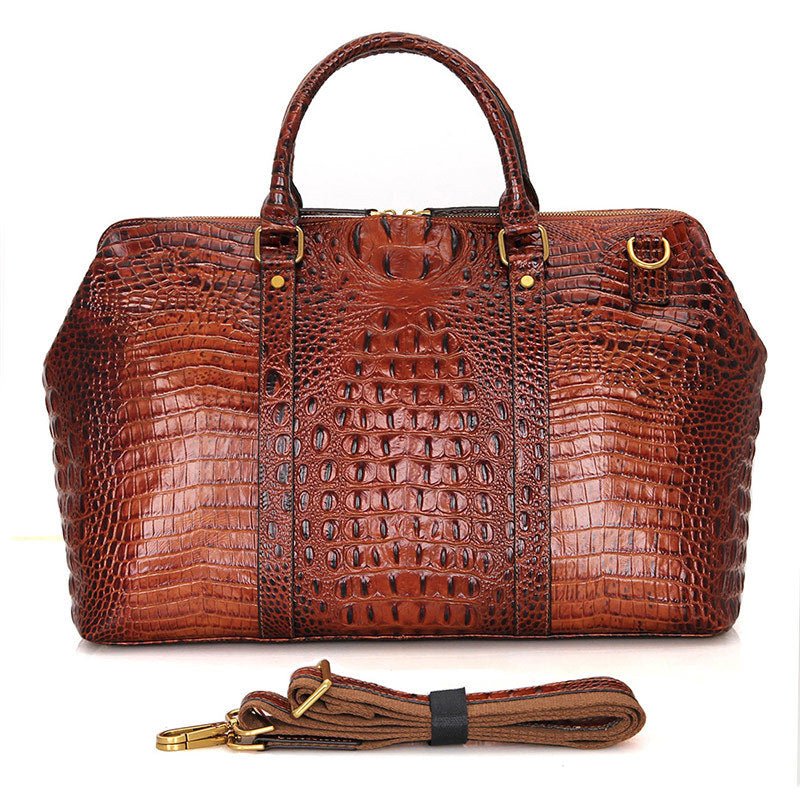 Ultimate Leather Weekender bag made of full grain leather, spacious and stylish, perfect for travel with a sleek design.