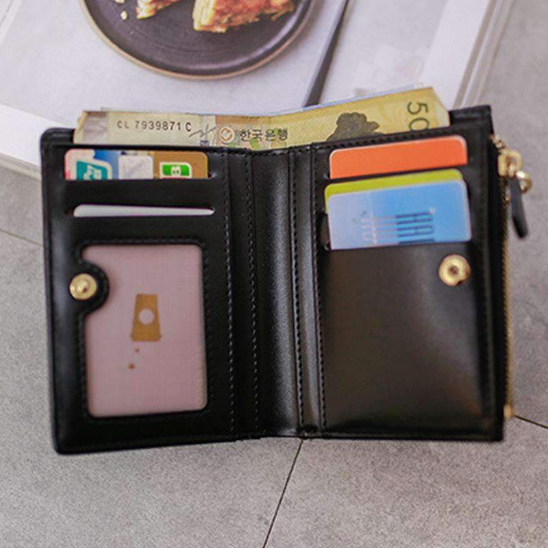 AMZER Bifold Tassel Women PU Leather Wallet in black, showcasing its sleek design and multiple card holder compartments.