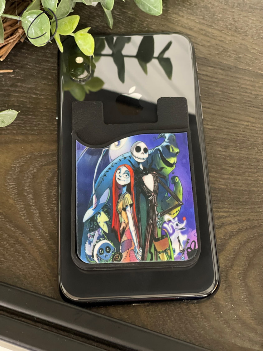 Nightmare Before Christmas Card Caddy Phone Wallet with microfiber screen cleaner, featuring iconic movie designs.