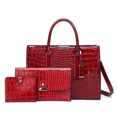 Solid Color Three-Piece Young Lady's Messenger Bag set featuring a stylish crocodile pattern, made from first layer cowhide with a zipper opening.