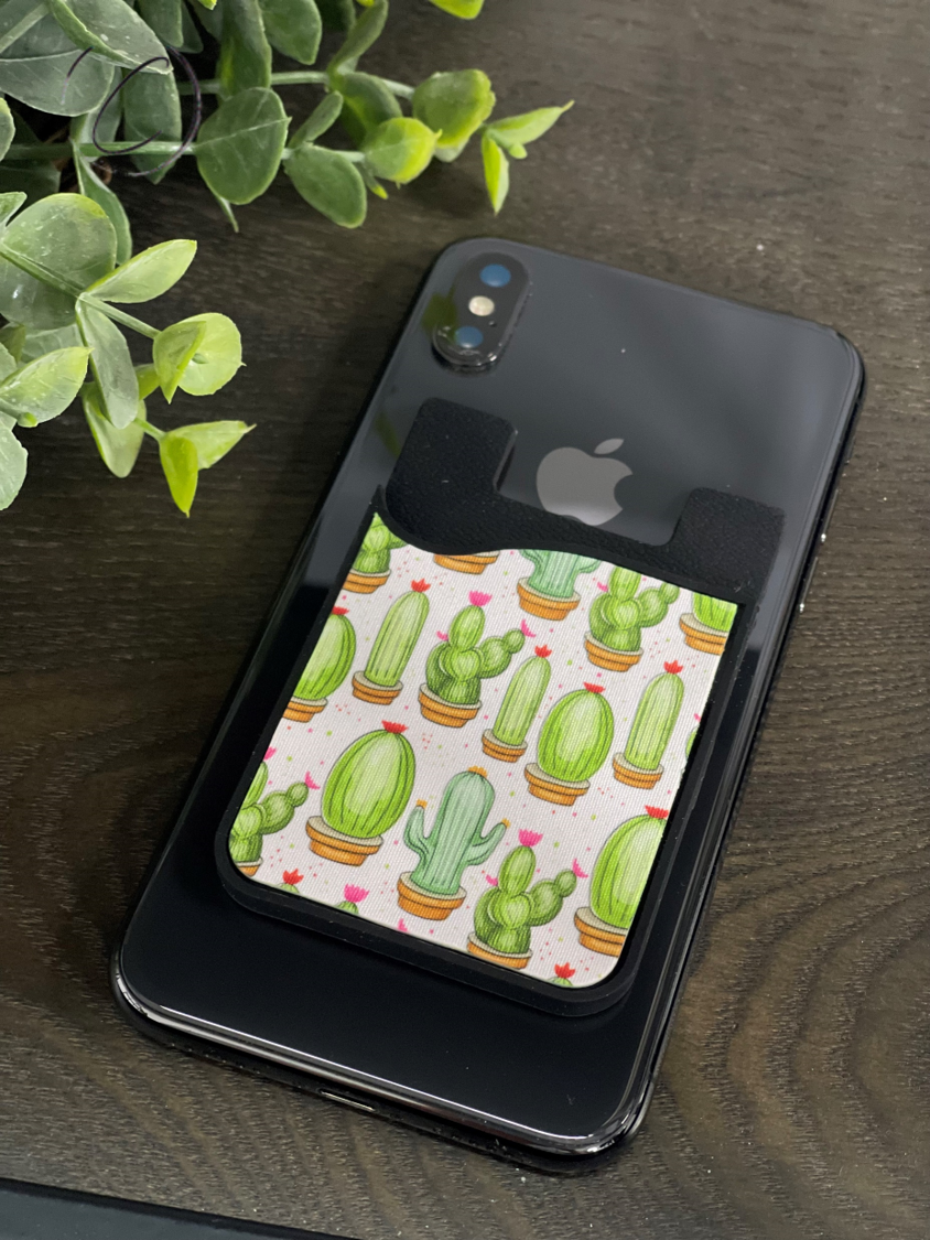 Watercolor Cacti Caddy Phone Wallet featuring a vibrant cactus design with a removable microfiber screen cleaner.