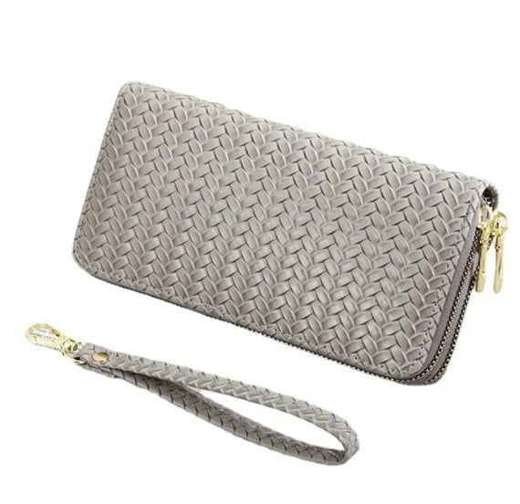 A stylish weaved designer wallet for women, showcasing multiple compartments and available in various colors.