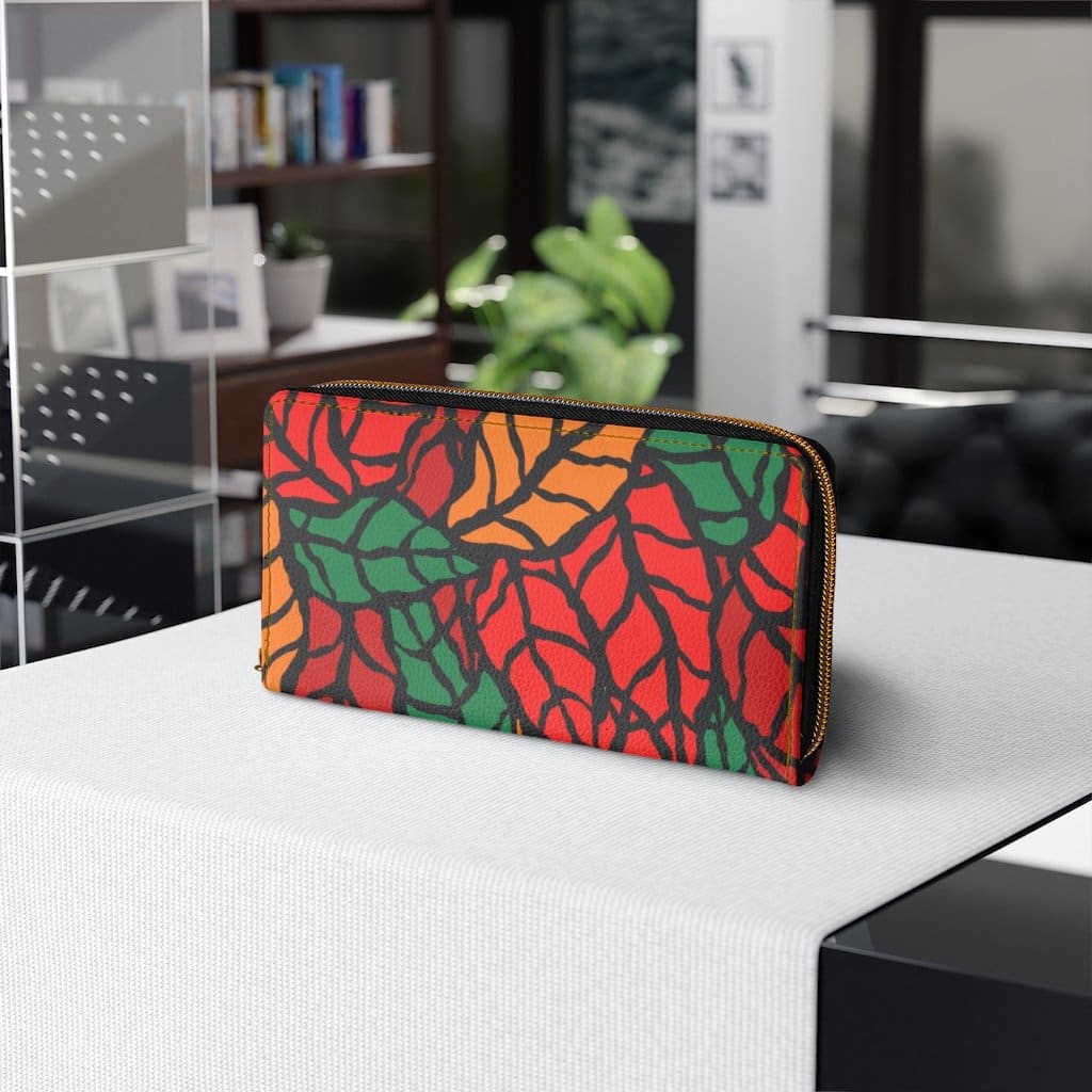 Stylish red and green zip wallet for women, made from faux leather with gold stitching, perfect for autumn.