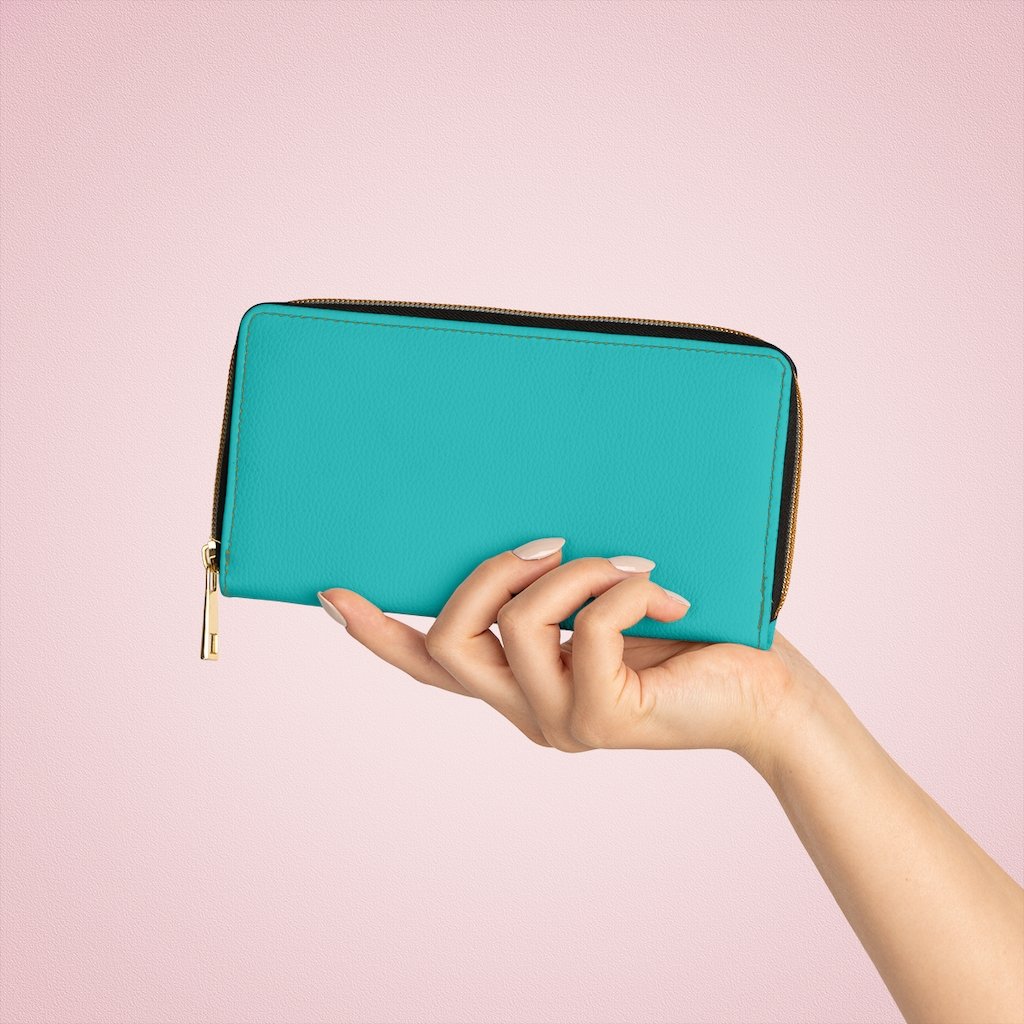 Teal green women's zip wallet made of faux leather with gold stitching and multiple pockets for cards and cash.