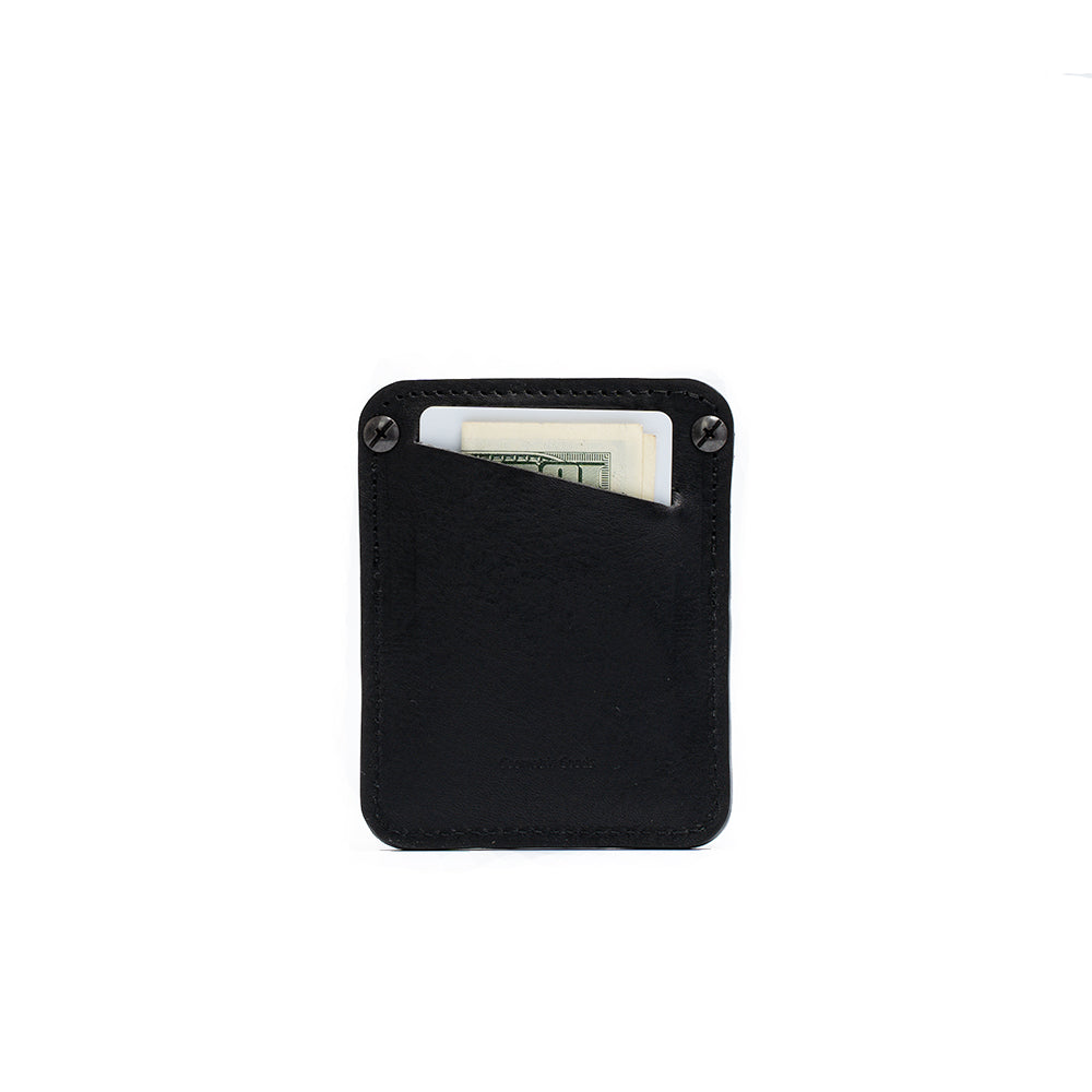 A stylish leather AirTag wallet with D-ring, showcasing its compact design and hidden AirTag pocket, perfect for holding cards securely.