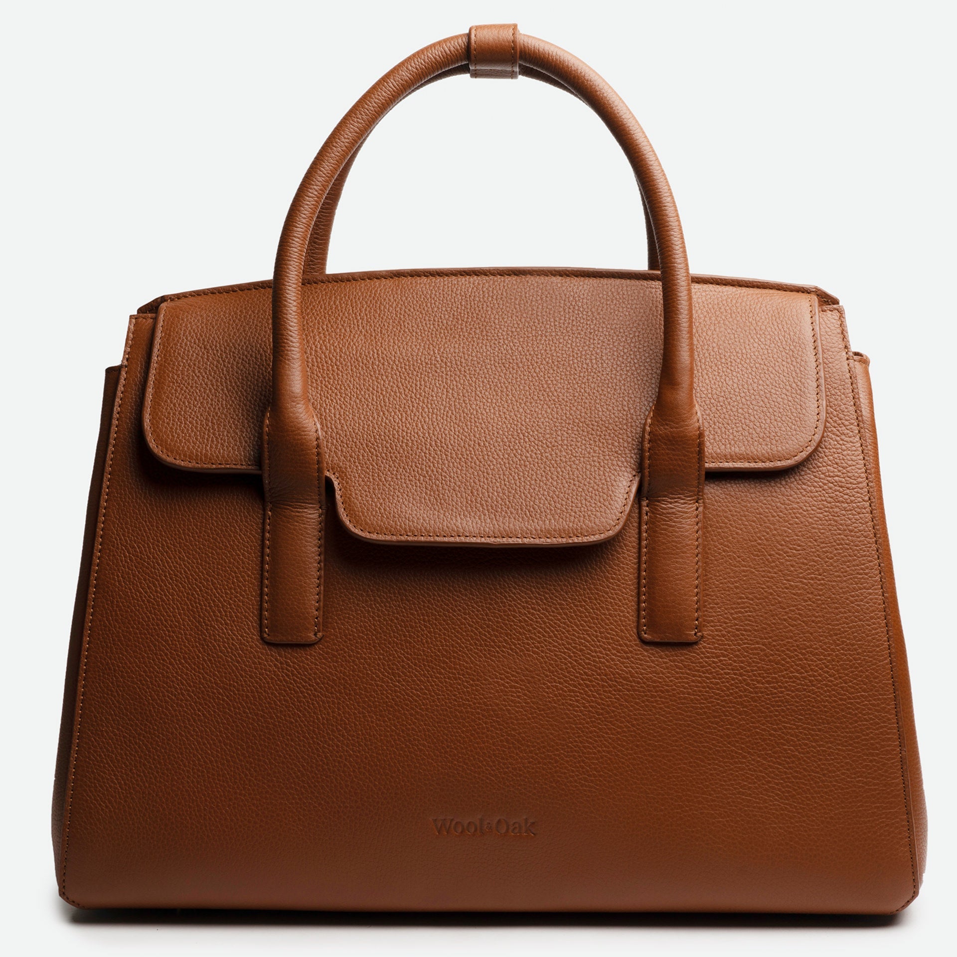 All Day Bag in pebble leather, showcasing its versatile design and spacious compartments.