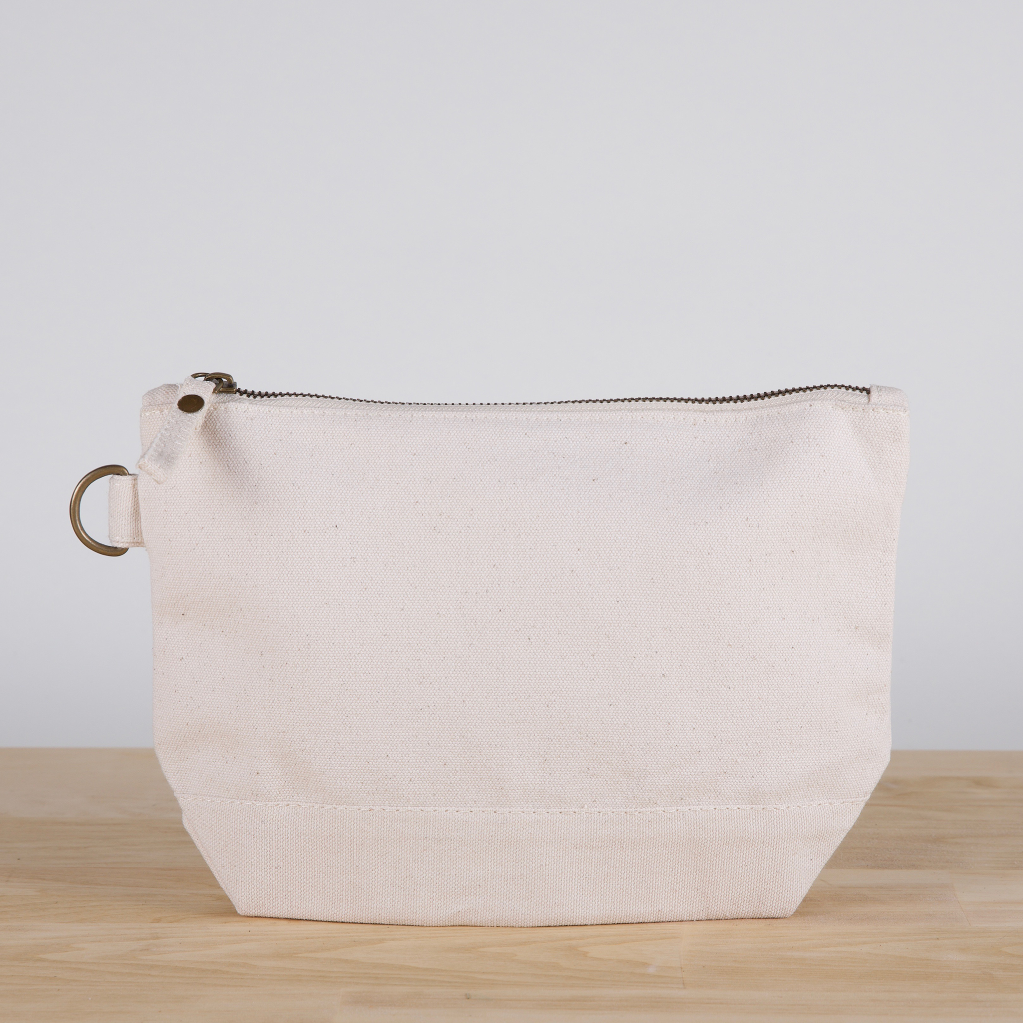 All In Zip Top Pouch in heavyweight canvas with a sturdy zipper and loop ring, perfect for organizing small items.