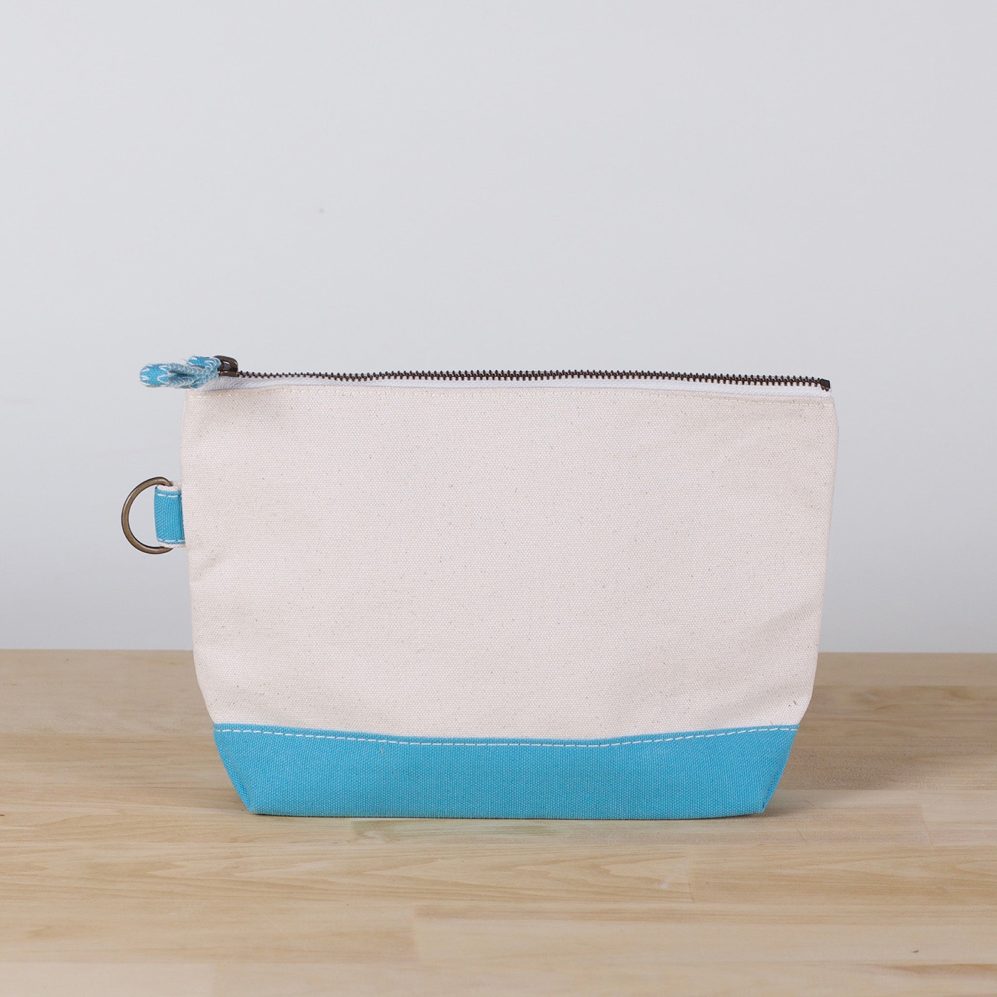 All In Zip Top Pouch in heavyweight canvas with a sturdy zipper and loop ring, perfect for organizing small items.