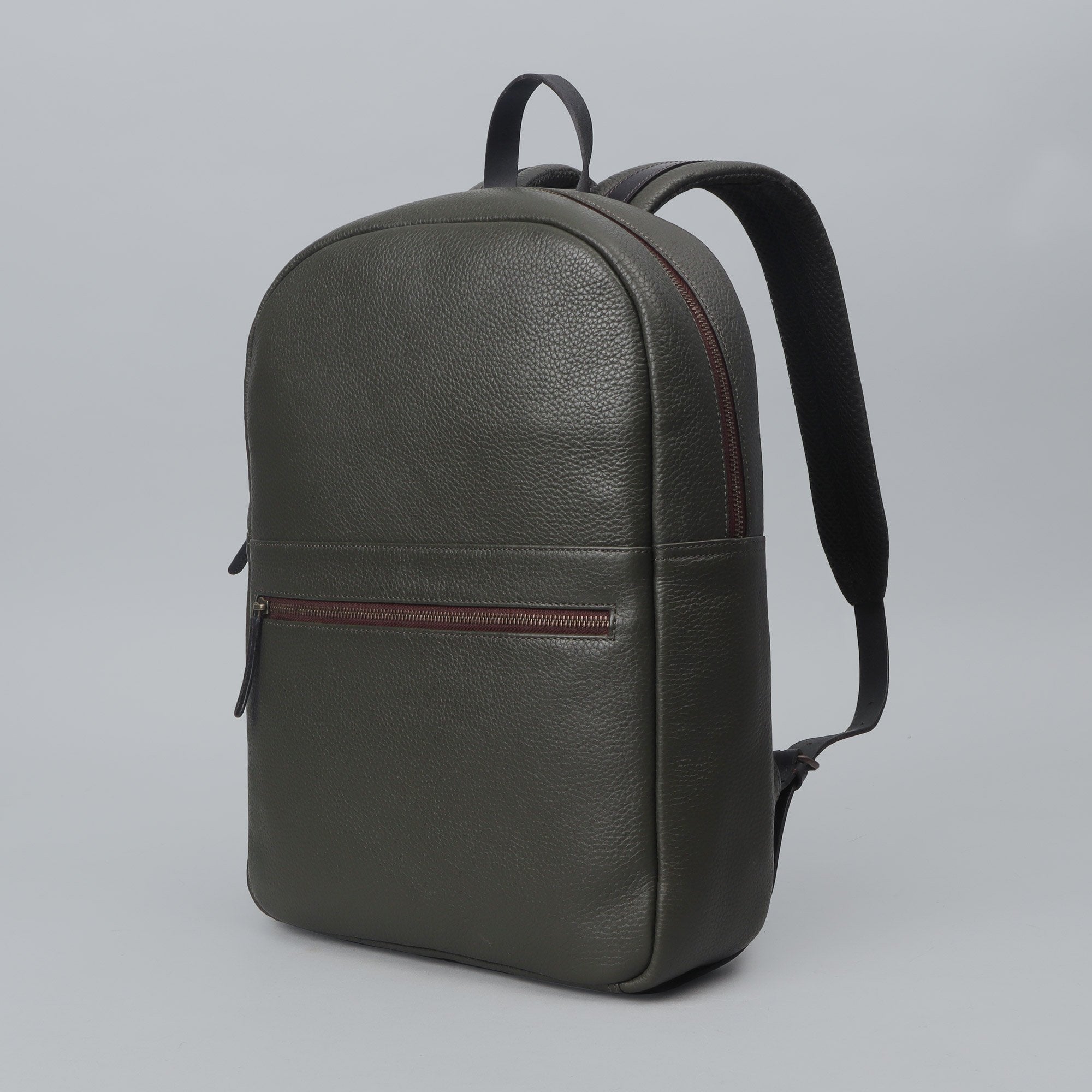 Alabama Leather Backpack made from premium full grain leather, featuring multiple pockets and a spacious laptop compartment, ideal for daily use.